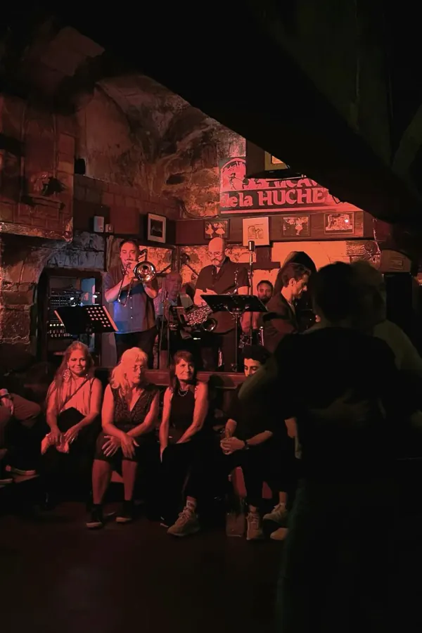 A jazz band in a cellar club, red light.