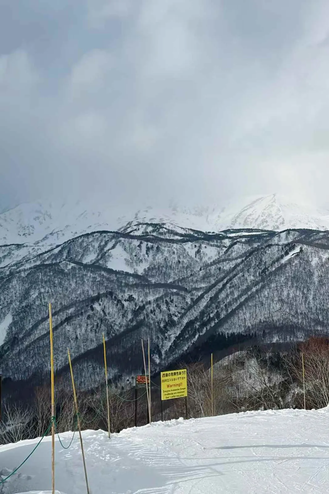 Snowy ridges above a ski area.